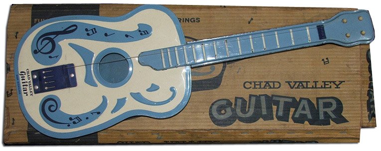 The Chad Valley guitar, one of a range of musical instruments inspired by the new music of the Sixties.  Many a budding musician first played a guitar like this!