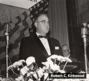 F.W. Woolworth Co. CEO Robert C. Kirkwood addresses British Managers at the subsidiary's 50th birthday. He stunned them into silence.