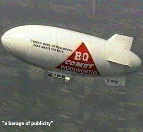 The Woolworth Group airship toured the City skyline, hoping to persuade investors to reject the Dixons takeover bid