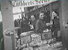 Cuthbert Seeds in the temporary F. W. Woolworth store in Plymouth Market during World War II.  Vegetable seeds supported the "Dig for Victory"